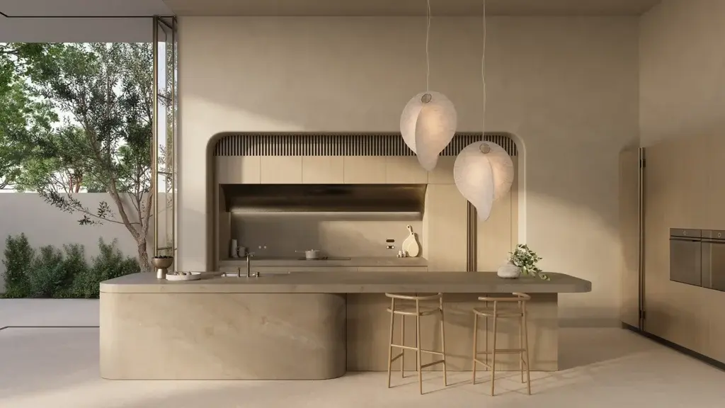 Modern Caesarstone 8521 Wild Taj beige kitchen with curved island, pendant lights, and minimalist design.